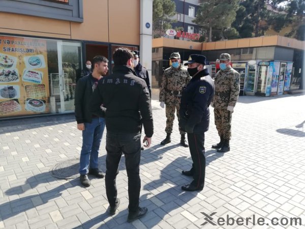 Sumqayıtda Daxili Qoşunların əsgərləri  polislə birgə insanları evdə qalmağa çağırır - VİDEO (FOTO)