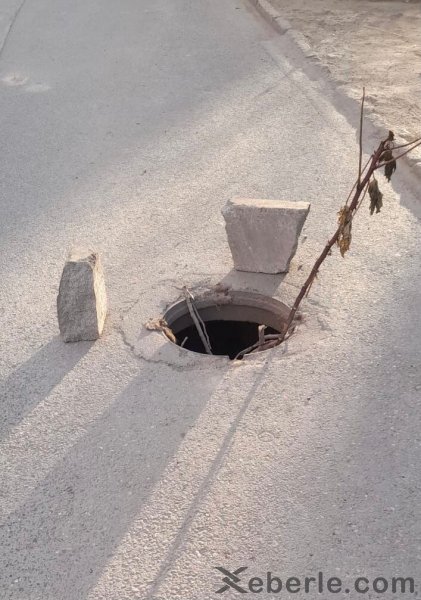 Sumqayıtda agzı açıq quyu insanlar üçün təhlükə mənbəyinə çevrilib - FOTO